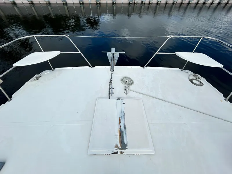 Slide: The Image of Bow deck of 2004 Endeavour Catamaran Victory with anchor and railing. - 12