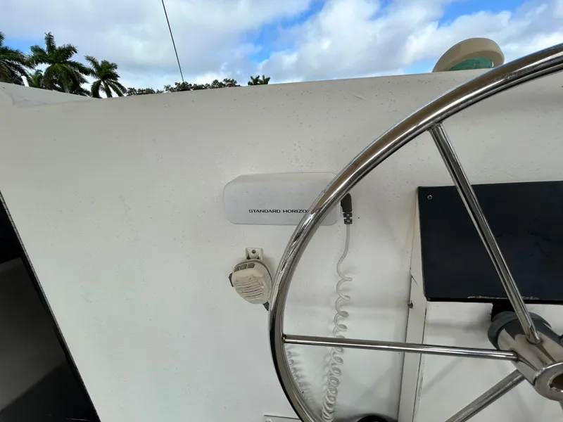 Slide: The Image of Close-up of the helm on a 2004 Endeavour Catamaran Victory model. - 41