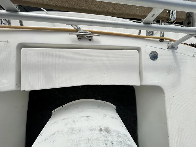 Slide: The Image of 2004 Endeavour Catamaran Victory deck with white textured surface and railing. - 45