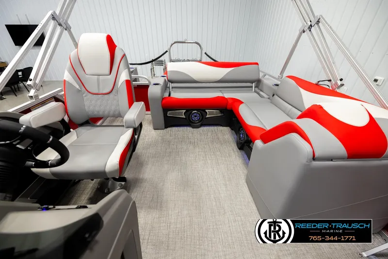 Slide: The Image of 2026 Avalon LSZ VRB boat interior with red and gray seating, modern design. - 14