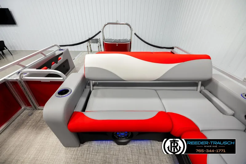 Slide: The Image of 2026 Avalon LSZ VRB pontoon boat interior with red and gray seating. - 15