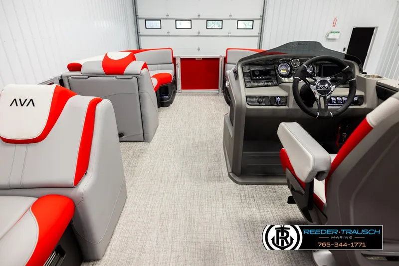 Slide: The Image of 2026 Avalon LSZ VRB boat interior with red and gray seating, modern dashboard, and steering wheel. - 17