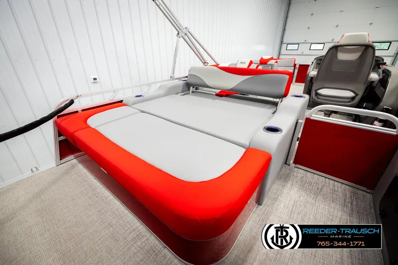 Slide: The Image of 2026 Avalon LSZ VRB boat interior with red and gray seating, modern design. - 24