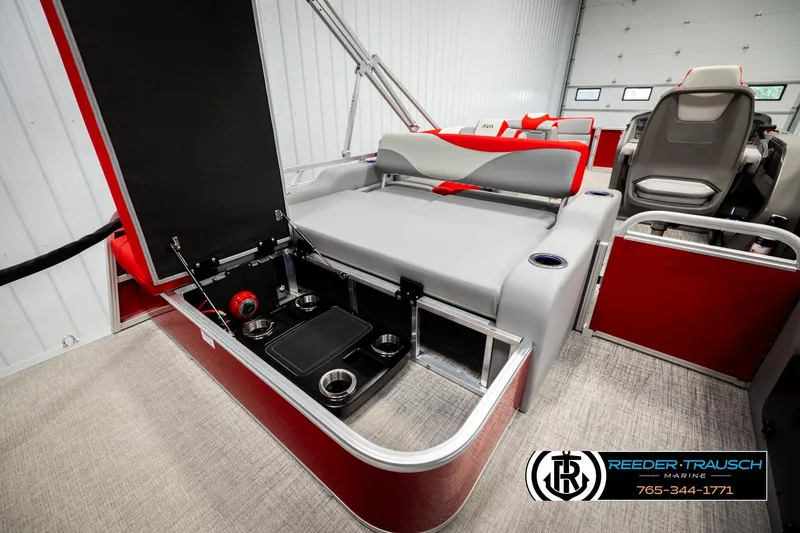 Slide: The Image of 2026 Avalon LSZ VRB boat interior with seating, storage, and cup holders in a modern design. - 26