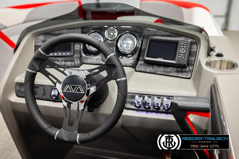 Slide: The Image of 2026 Avalon LSZ VRB boat dashboard with steering wheel and modern controls. - 33