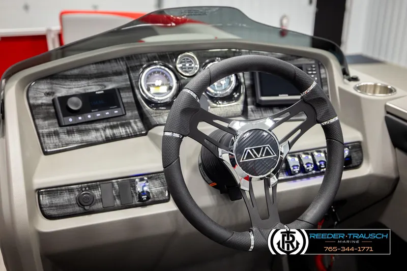 Slide: The Image of Steering wheel and dashboard of 2026 Avalon LSZ VRB boat, featuring modern controls and design. - 34