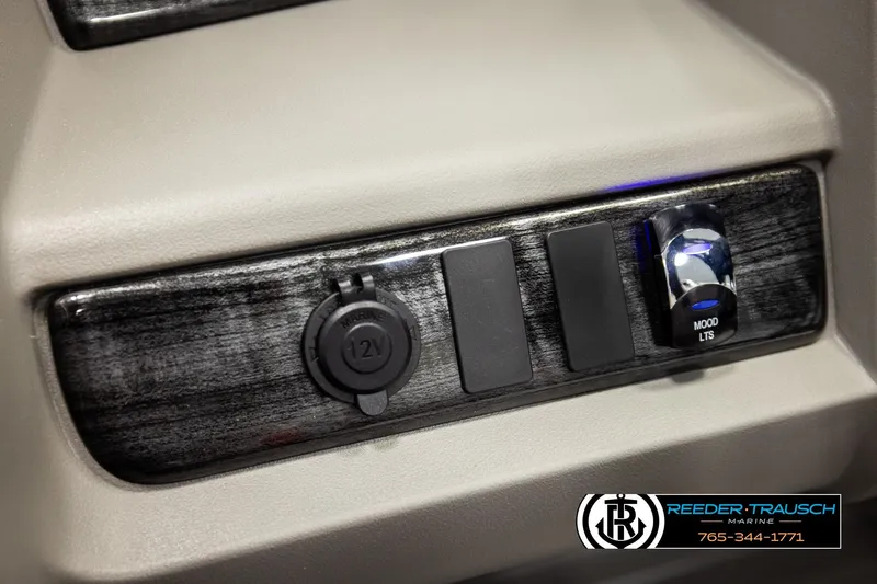 Slide: The Image of 2026 Avalon LSZ VRB dashboard with 12V outlet and mood lighting switch. - 36