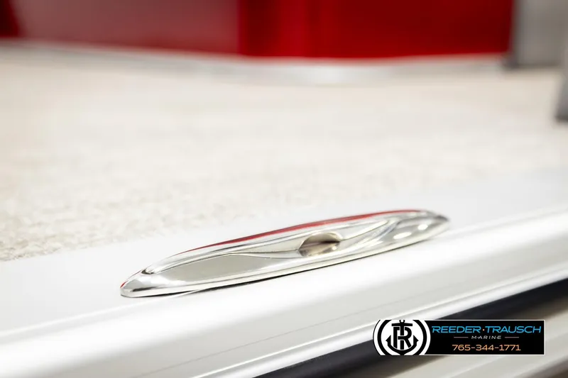 Slide: The Image of Close-up of 2026 Avalon LSZ VRB boat cleat with Reeder-Trausch Marine logo. - 54