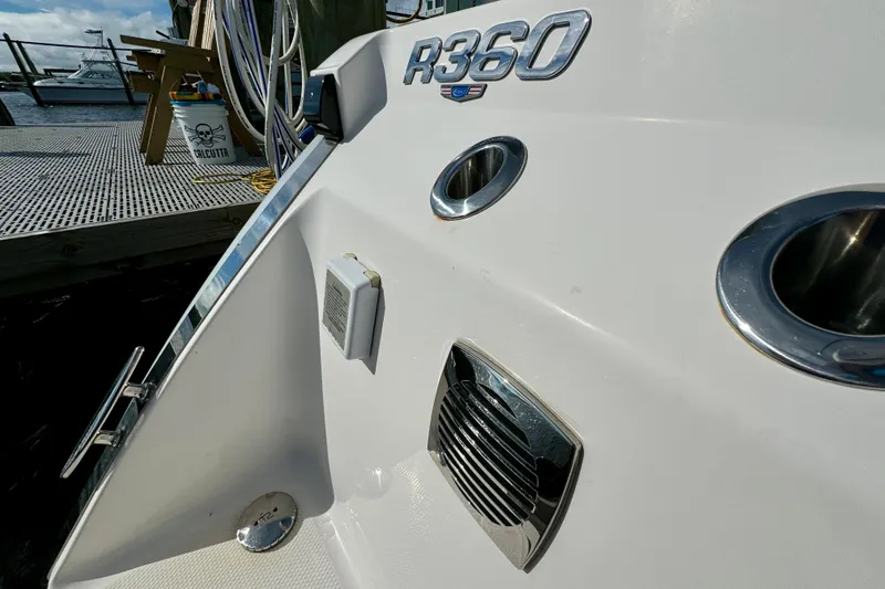 Slide: The Image of 2022 Robalo R360 Center Console boat detail at dockside. - 24