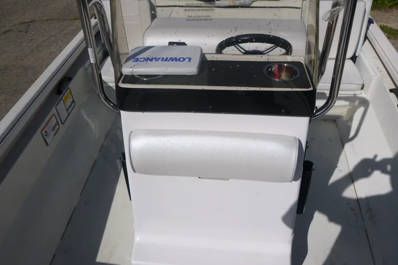 Slide: The Image of 2024 Ranger RB200 boat console with steering wheel and Lowrance equipment. - 12