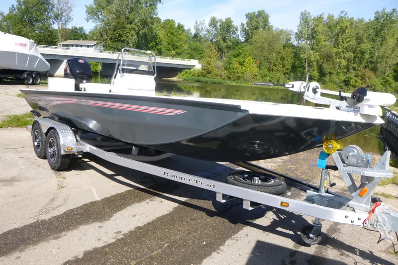 Slide: The Image of 2024 Ranger RB200 boat on trailer by a lake, ready for launch. - 3