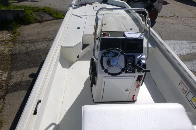 Slide: The Image of 2024 Ranger RB200 boat interior with steering console and navigation equipment. - 5