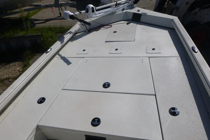 Slide: The Image of 2024 Ranger RB200 boat deck with storage compartments and mounted equipment. - 7