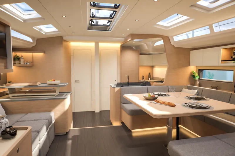 Slide: The Image of Luxurious interior of 2026 Dufour 54 yacht with modern dining and seating area. - 31