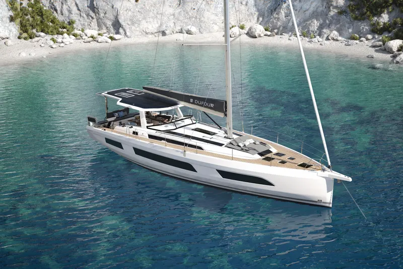 Slide: The Image of 2026 Dufour 54 yacht anchored in a serene, turquoise bay with rocky cliffs. - 6