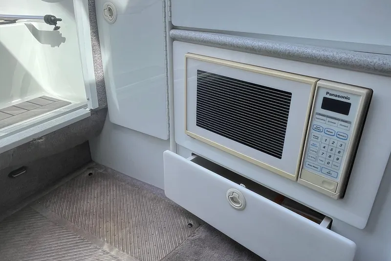 Slide: The Image of Interior of 1996 Formula 330 Sun Sport with built-in Panasonic microwave. - 22