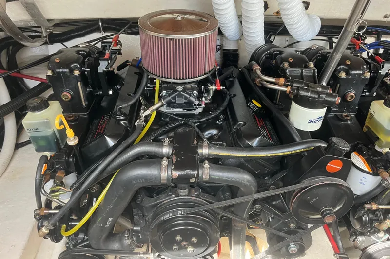 Slide: The Image of Engine of a 1996 Formula 330 Sun Sport boat, showcasing detailed components. - 6