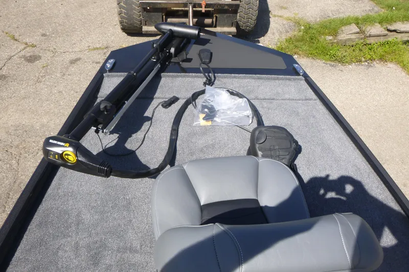 Slide: The Image of 2026 Tracker Bass Tracker Classic XL boat interior with trolling motor and seat. - 7