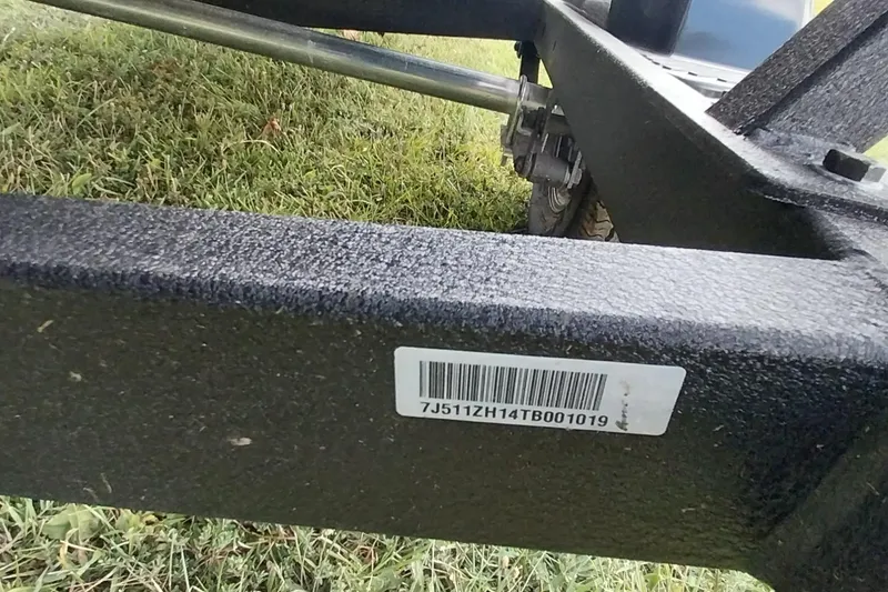 Slide: The Image of 2023 Tracker Bass Tracker Classic XL trailer with visible barcode and serial number. - 26