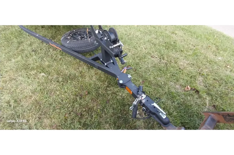 Slide: The Image of Trailer hitch of 2023 Tracker Bass Tracker Classic XL on grass. - 27