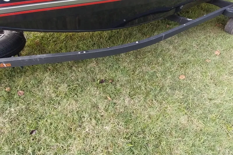 Slide: The Image of 2023 Tracker Bass Tracker Classic XL trailer on grass. - 3