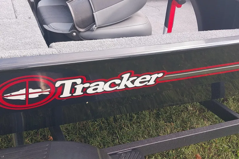 Slide: The Image of 2023 Tracker Bass Tracker Classic XL boat with logo and seating detail. - 8