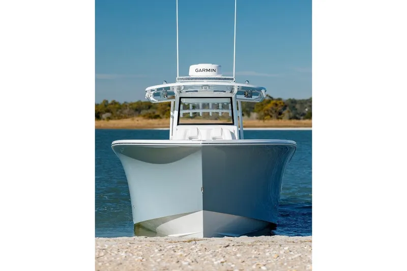 Slide: The Image of 2024 Onslow Bay 37 Offshore boat on water, front view, clear sky background. - 5