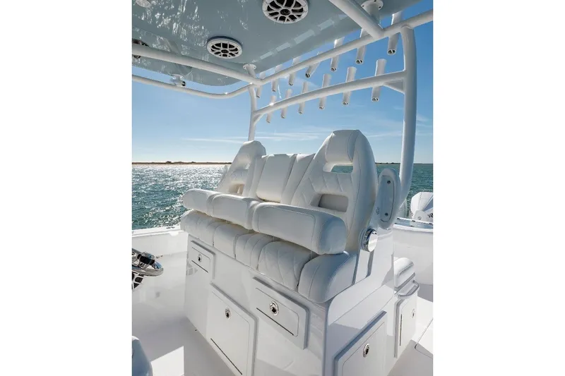 Slide: The Image of 2024 Onslow Bay 37 Offshore boat with luxurious seating and ocean backdrop. - 8