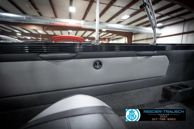 Slide: The Image of Interior view of 2026 Lund 2275 Baron boat at Reeder-Trausch Marine showroom. - 27