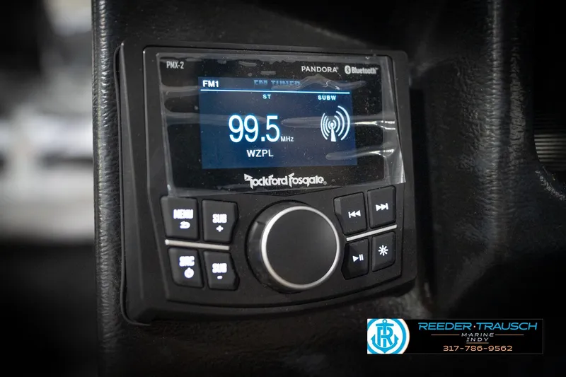 Slide: The Image of Rockford Fosgate PMX-2 stereo in 2026 Lund 2275 Baron boat, tuned to 99.5 FM. - 38