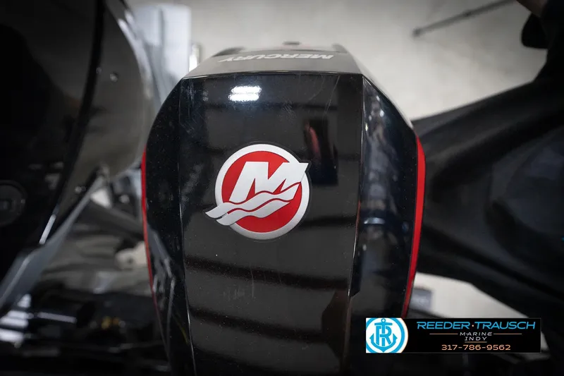 Slide: The Image of 2026 Lund 2275 Baron boat with Mercury engine, featuring Reeder-Trausch Marine branding. - 61