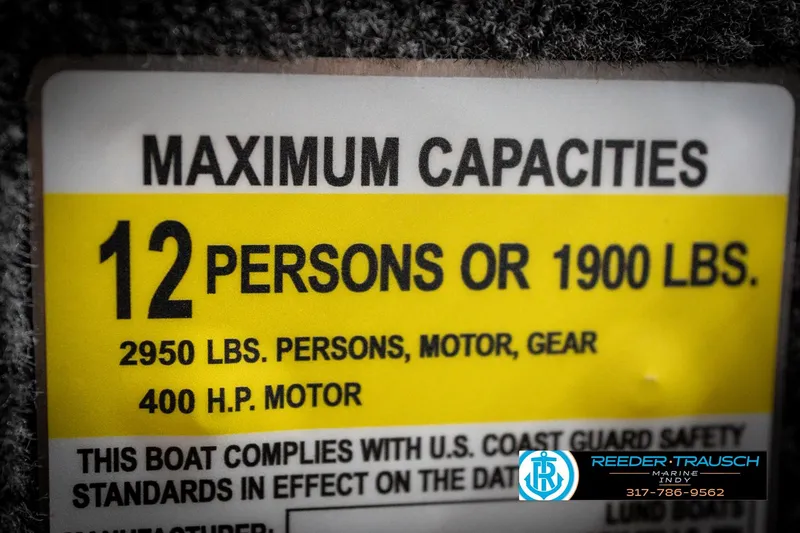 Slide: The Image of Maximum capacity label for 2026 Lund 2275 Baron boat, 12 persons or 1900 lbs. - 71