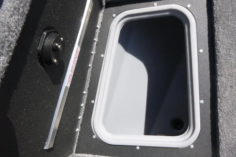 Slide: The Image of 2026 Tracker Targa V-19 WT boat storage compartment, featuring a sleek, durable design. - 11