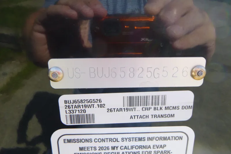 Slide: The Image of 2026 Tracker Targa V-19 WT boat identification and emissions control information plate. - 18