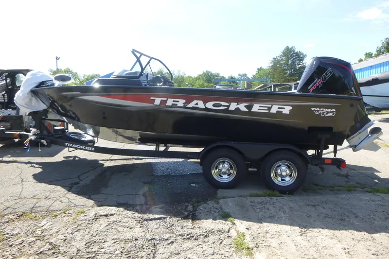 Slide: The Image of 2026 Tracker Targa V-19 WT boat on trailer, parked outdoors. - 4