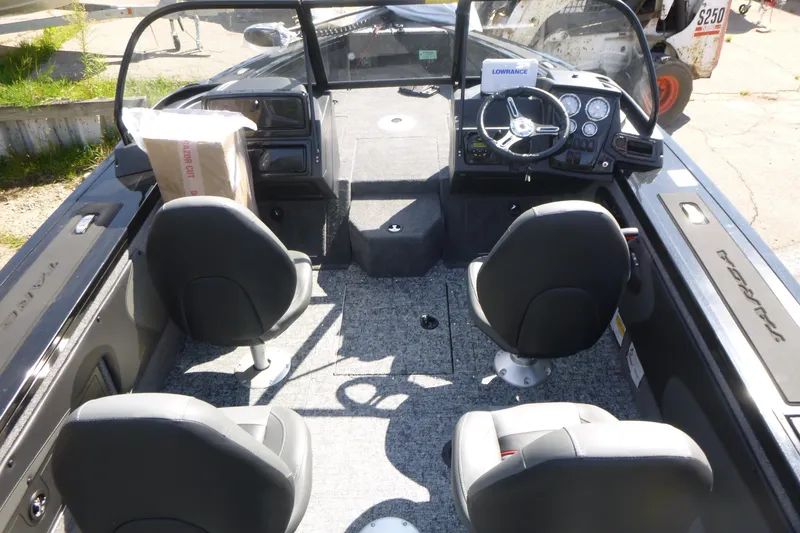 Slide: The Image of Interior of 2026 Tracker Targa V-19 WT boat with seating and control panel. - 5