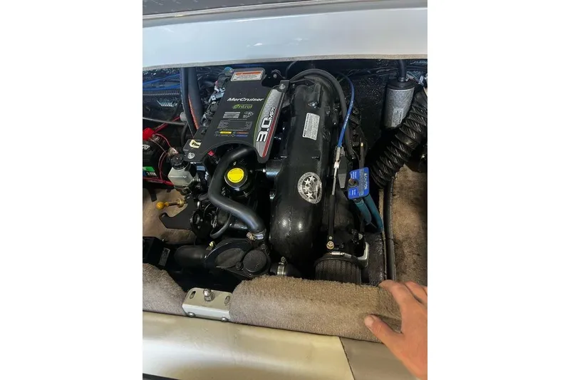 Slide: The Image of Engine compartment of a 2013 Stingray 195RX boat with MerCruiser 3.0L engine. - 20