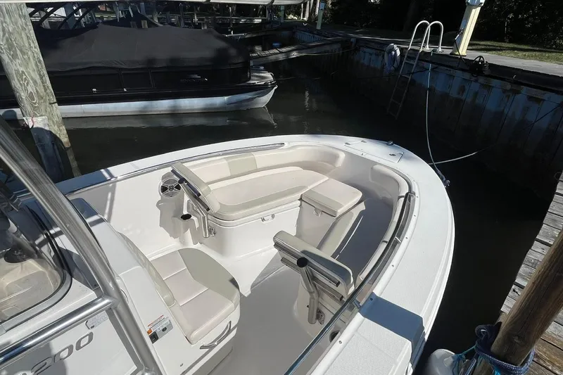 Slide: The Image of 2017 Robalo R200 Center Console boat docked in marina. - 7