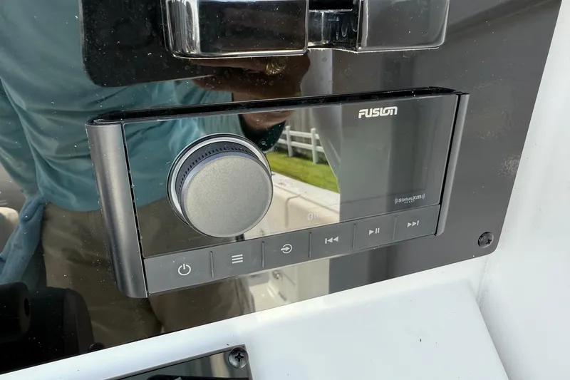 Slide: The Image of Fusion audio system on 2026 Sea Hunt Ultra 245 SE boat dashboard. - 18