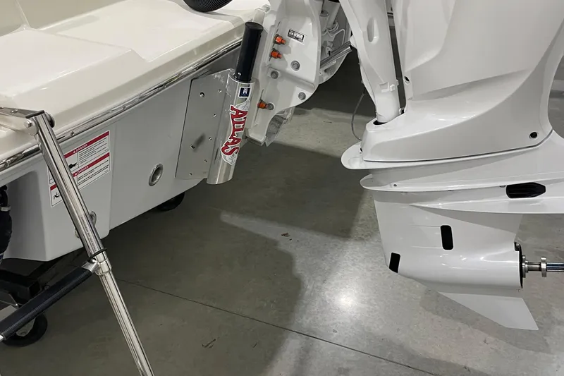 Slide: The Image of 2026 Pathfinder 2400 TRS boat with Atlas jack plate and outboard motor. - 18