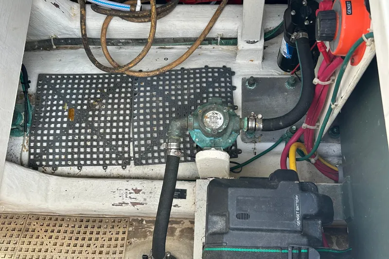 Slide: The Image of Engine compartment of 2004 Sabre 36 FB boat with visible wiring and components. - 41