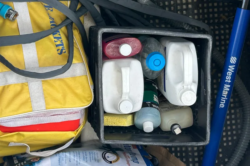 Slide: The Image of Storage box with cleaning supplies and marine equipment on a 2004 Sabre 36 FB boat. - 47