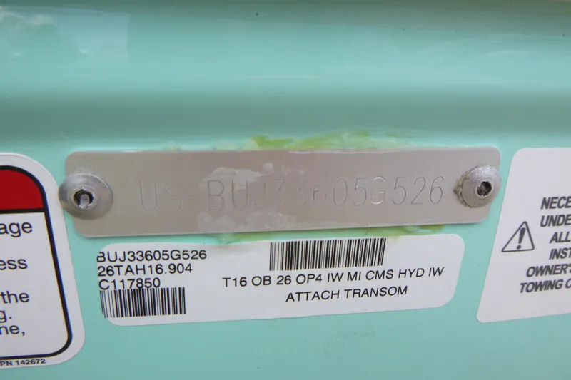 Slide: The Image of 2026 Tahoe T16 boat identification plate with serial and model numbers. - 16