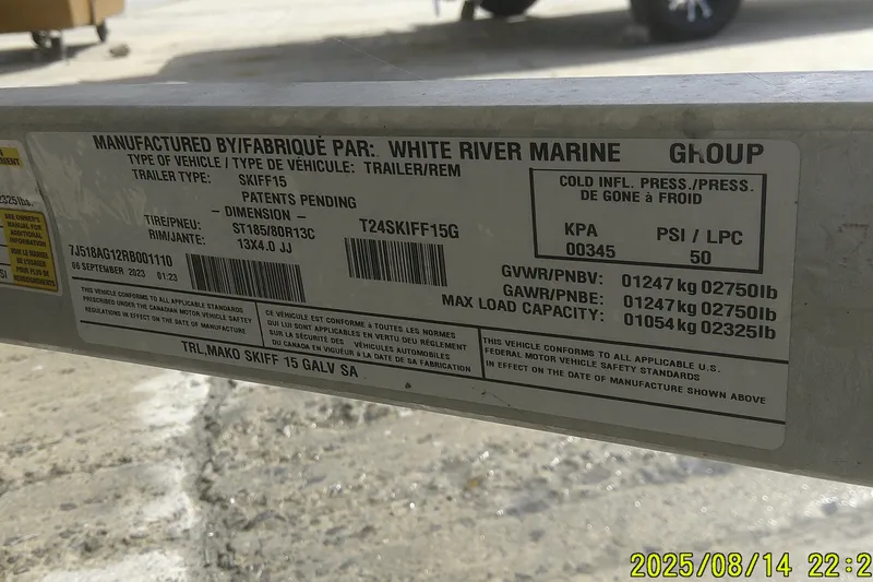 Slide: The Image of 2024 Mako Pro Skiff 15 CC trailer label with specifications and safety standards. - 21