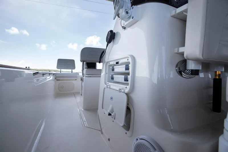 Slide: The Image of 2026 Boston Whaler 170 Montauk boat interior with steering console and seating. - 12