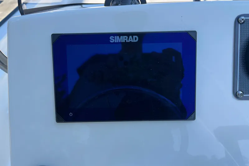 Slide: The Image of Simrad display on 2026 Boston Whaler 170 Montauk boat dashboard. - 15