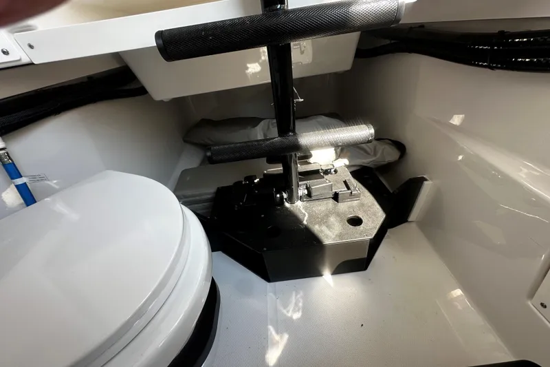 Slide: The Image of 2025 Blackfin 332 CC interior with toilet and storage area. - 13