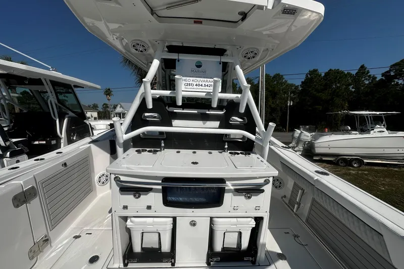 Slide: The Image of 2025 Blackfin 332 CC boat interior with fishing station and storage compartments. - 4