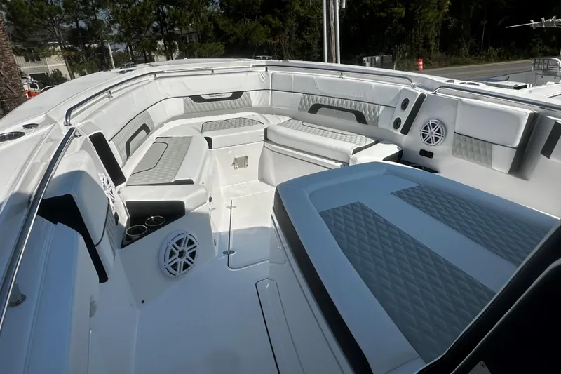 Slide: The Image of 2025 Blackfin 332 CC boat interior with luxurious seating and modern design. - 6
