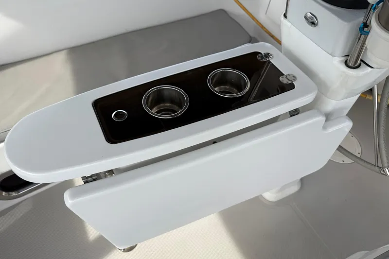 Slide: The Image of Cockpit table with cup holders on a 2011 Catalina 355 sailboat. - 10